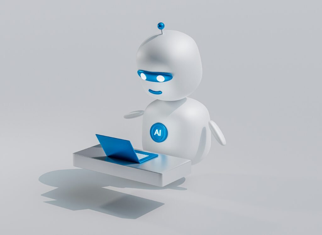 A cute white robot with blue accents sits at a desk with a laptop, illustrating AI technologies to boost website 2025.
